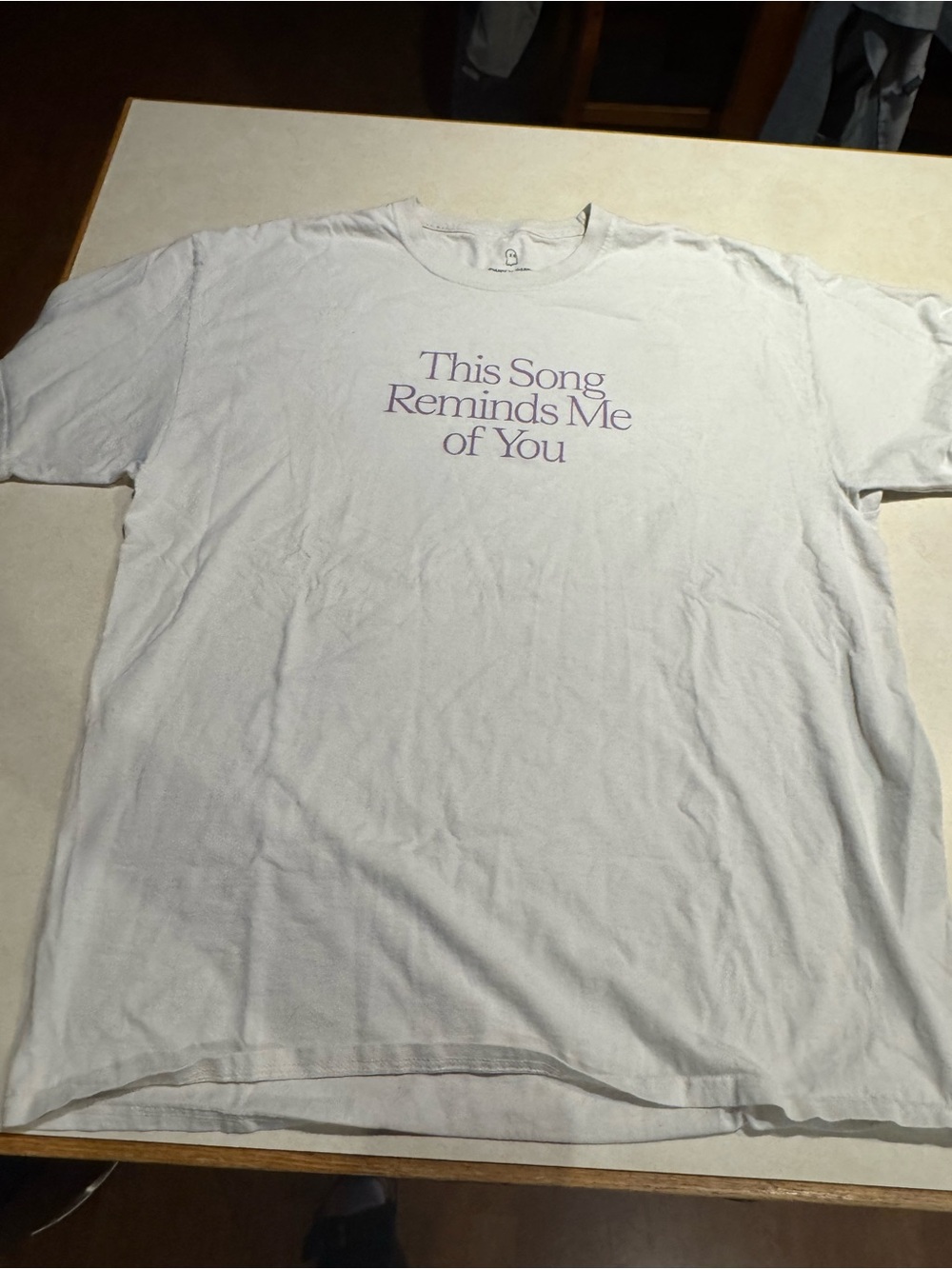 LONELY GHOST White Short-Sleeve Tee with Purple Text